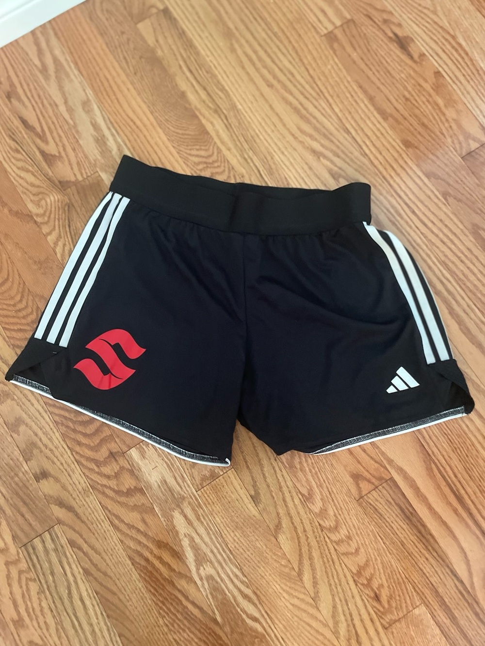 adidas Black Women's Athletic Shorts with White Stripes and Red Logo
